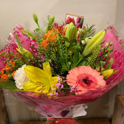 Spring vibes - Flowers chosen in spring colours and style to include spring selection of available. In a hand ties bouquet .